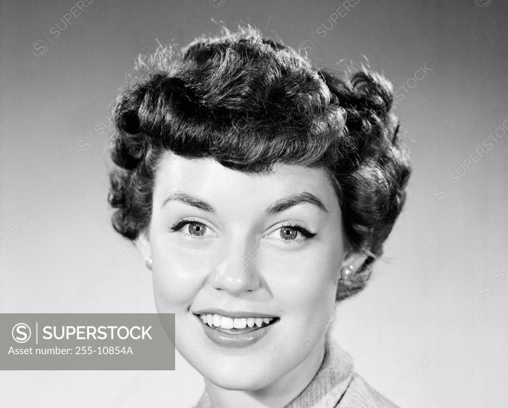 Stock Photo: 255-10854A Portrait of a young woman smiling