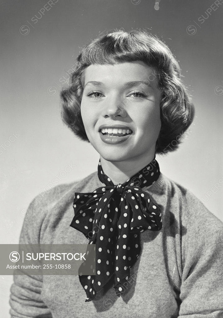 Stock Photo: 255-10858 Portrait of a young woman smiling