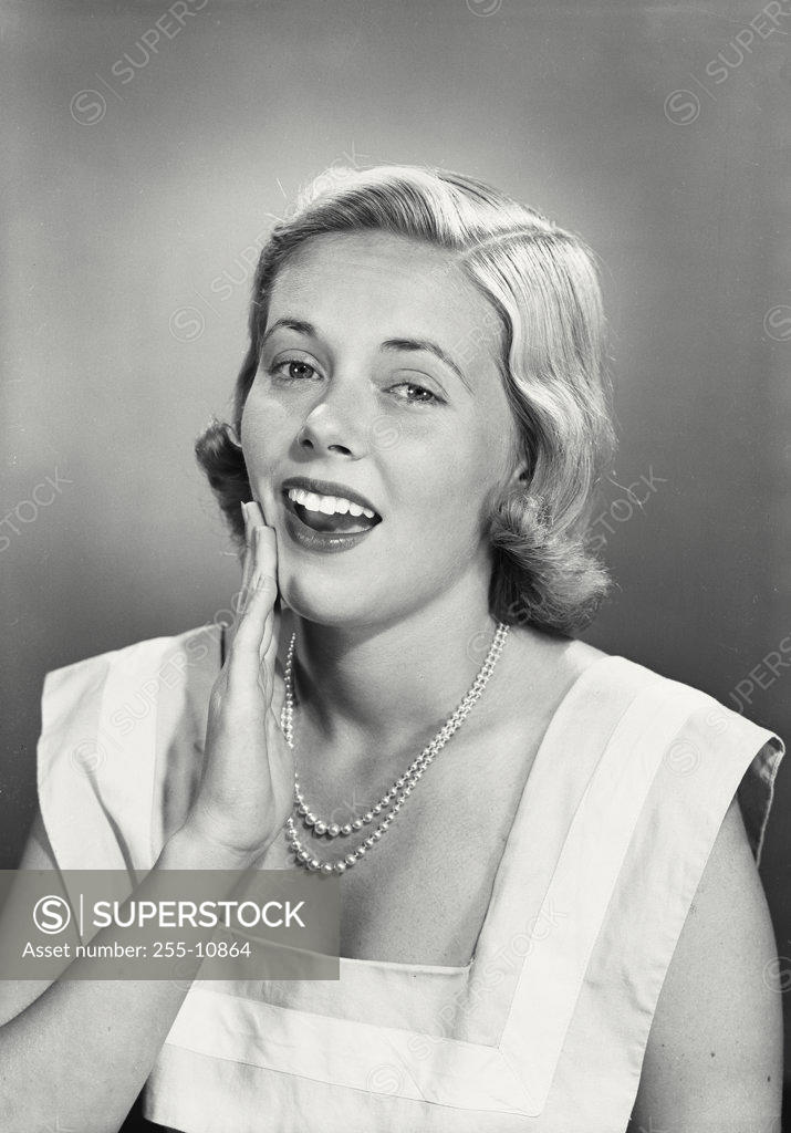 Stock Photo: 255-10864 Portrait of a young woman smiling