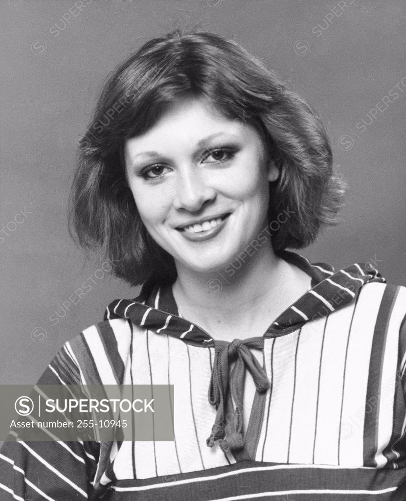 Stock Photo: 255-10945 Portrait of a young woman smiling