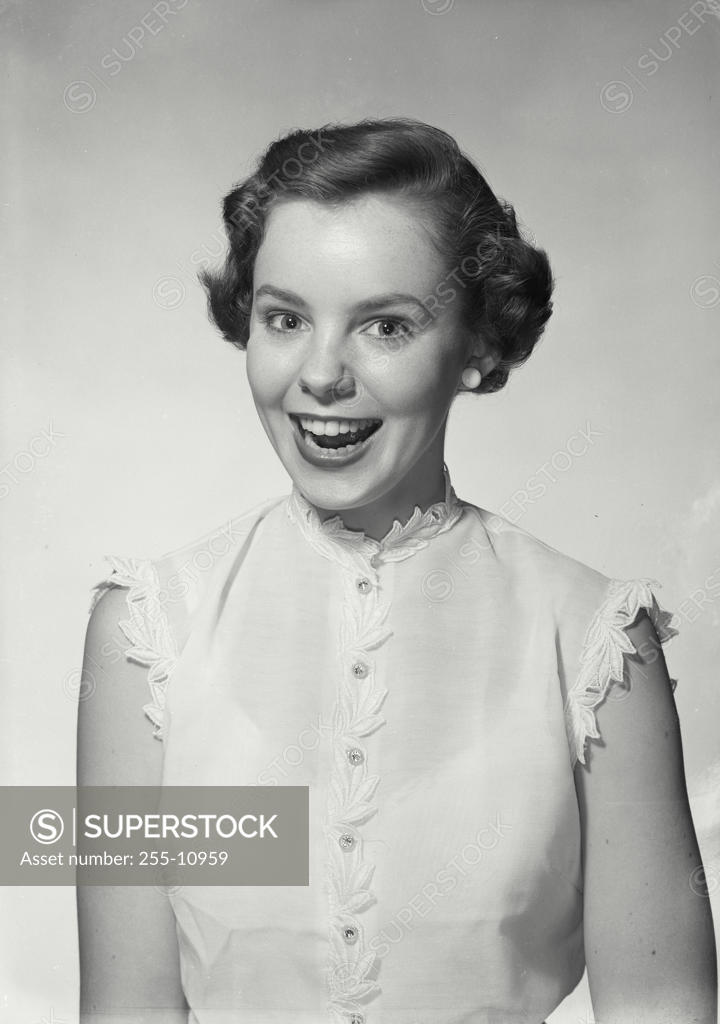 Stock Photo: 255-10959 Portrait of a young woman smiling