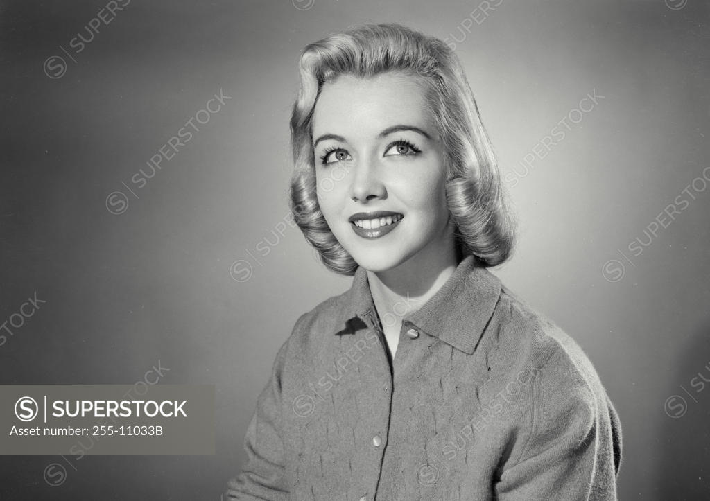 Stock Photo: 255-11033B Close-up of a young woman looking up
