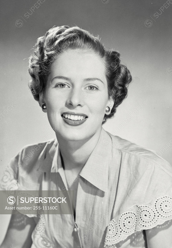 Stock Photo: 255-11160C Portrait of a young woman smiling
