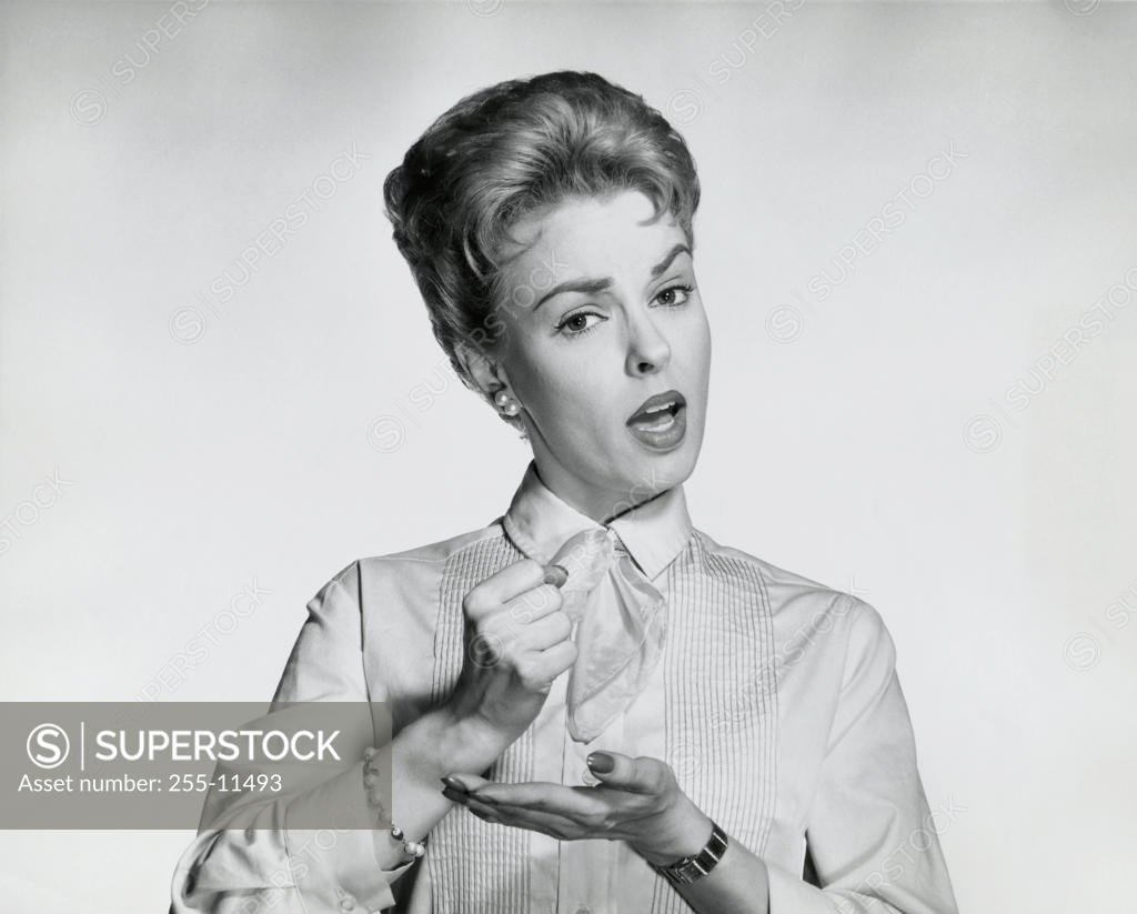 Stock Photo: 255-11493 Portrait of a mid adult woman gesturing