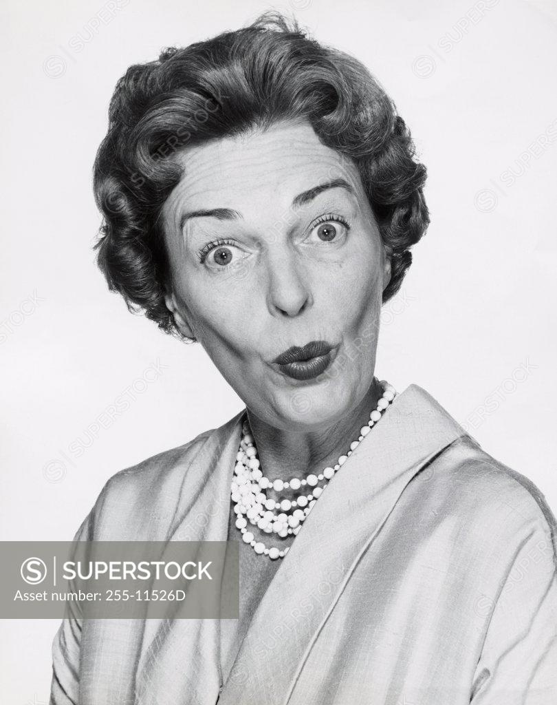 Stock Photo: 255-11526D Portrait of a mid adult woman puckering her lips