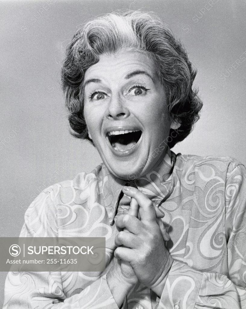 Stock Photo: 255-11635 Portrait of a mature woman looking surprised