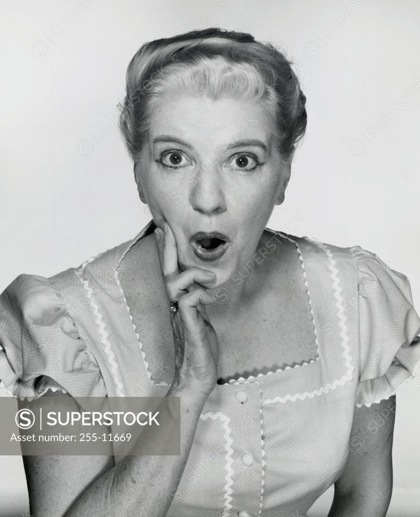 Stock Photo: 255-11669 Portrait of a senior woman looking surprised