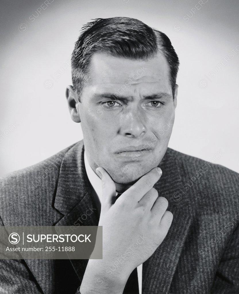Stock Photo: 255-11888 Close-up of a businessman thinking