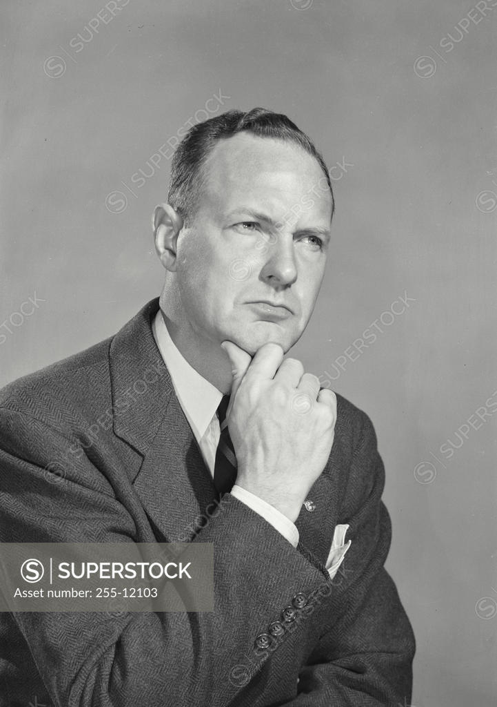Stock Photo: 255-12103 Close-up of a businessman looking serious