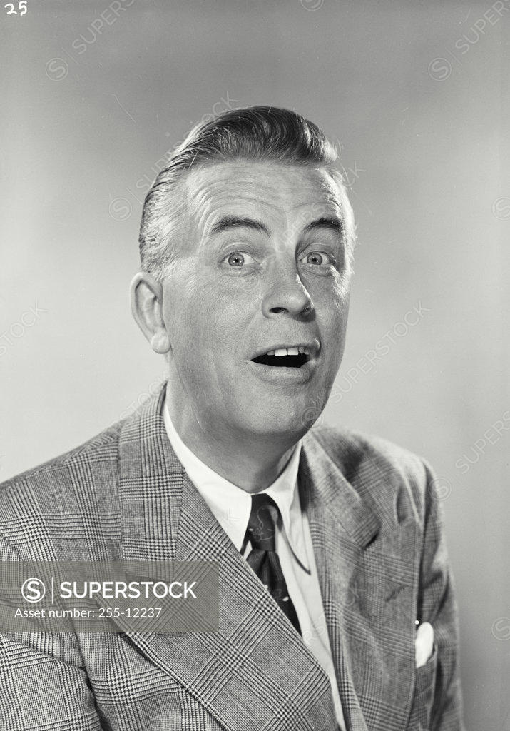 Stock Photo: 255-12237 Portrait of a businessman looking surprised