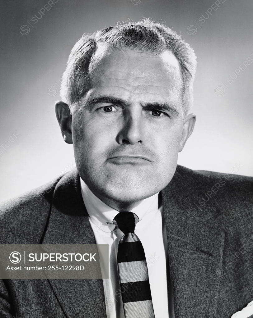Stock Photo: 255-12298D Portrait of a businessman looking serious