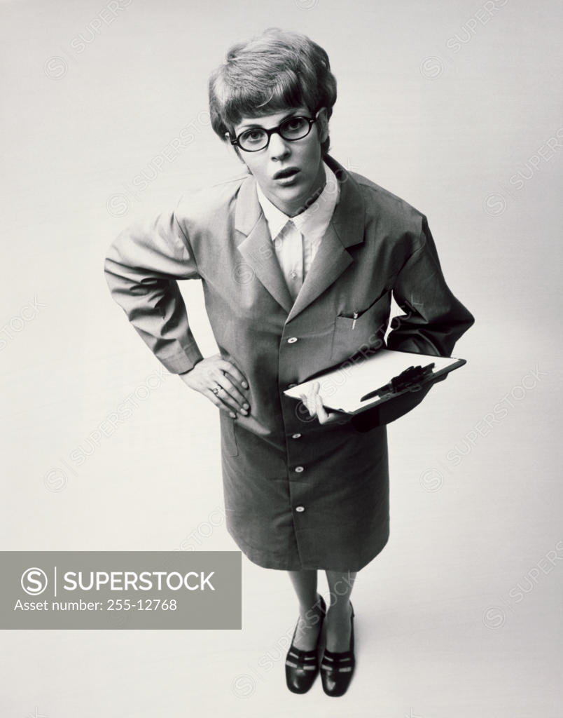 Stock Photo: 255-12768 Portrait of a female scientist holding a clipboard