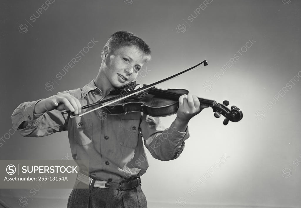 Stock Photo: 255-13154A Boy playing a violin