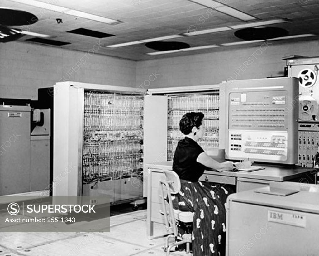 Stock Photo: 255-1343 Side profile of a technician working on a computer