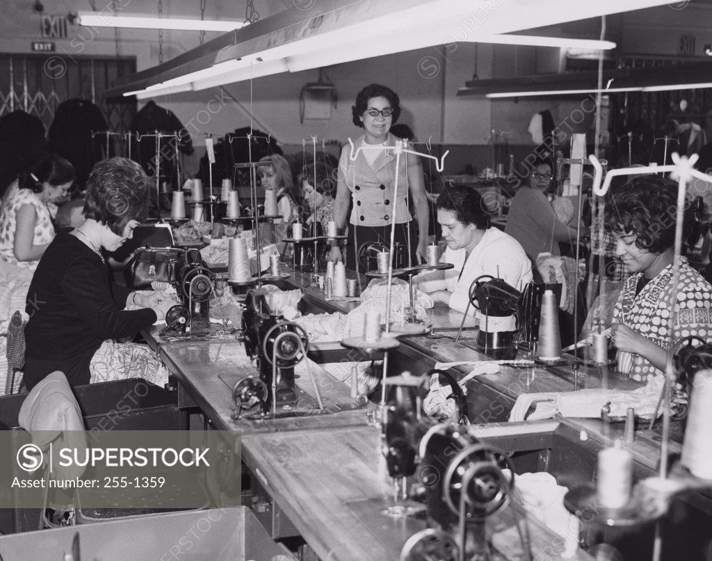 Stock Photo: 255-1359 Group of female workers in a textile factory