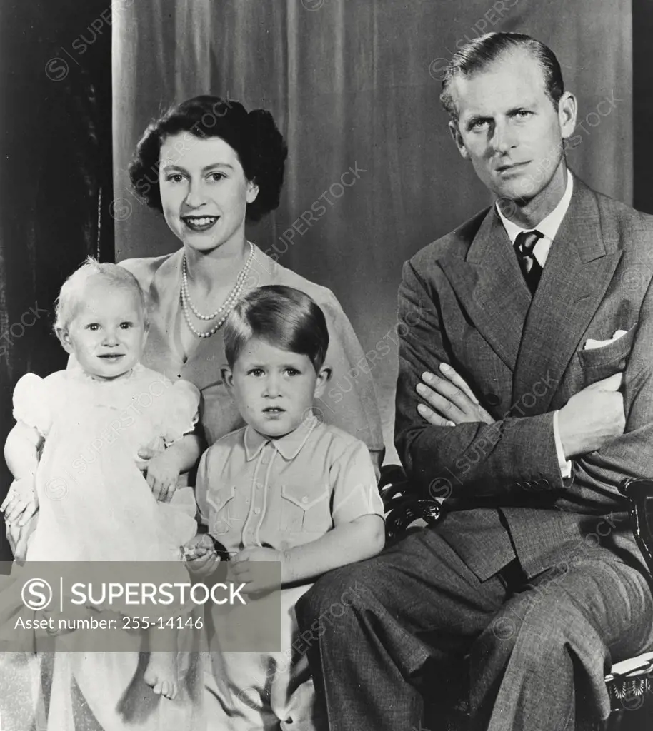 Vintage photograph. Royal Family Group Queen Elizabeth II and Duke of Edinburgh and their children, Prince Charles and Princess Anne