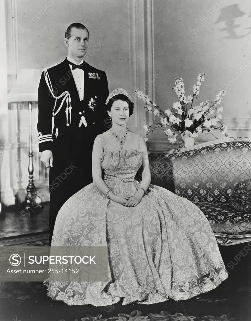 Vintage photograph. Her Royal Highness Princess Elizabeth and her husband His Royal Highness the Duke of Edinburgh at Clarence House, London, England