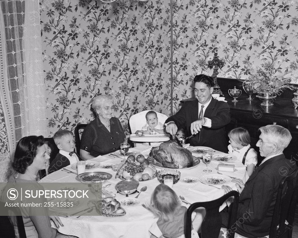 Stock Photo: 255-15835 Family at a dining table on Thanksgiving Day