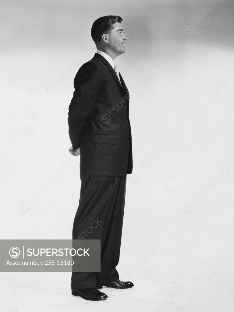 Stock Photo: 255-16180 Side profile of a businessman smiling