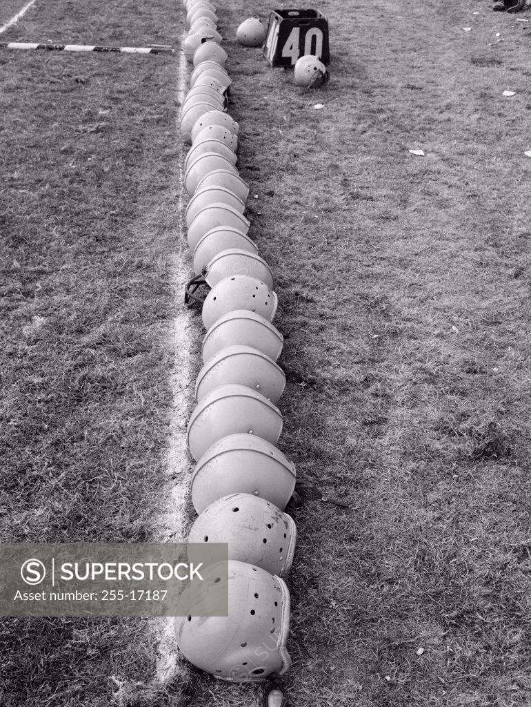 Stock Photo: 255-17187 High angle view of football helmets in a row