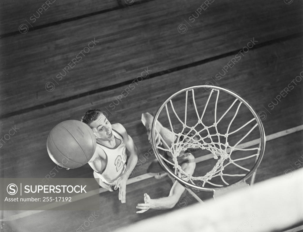 Stock Photo: 255-17192 High angle view of two young men playing basketball
