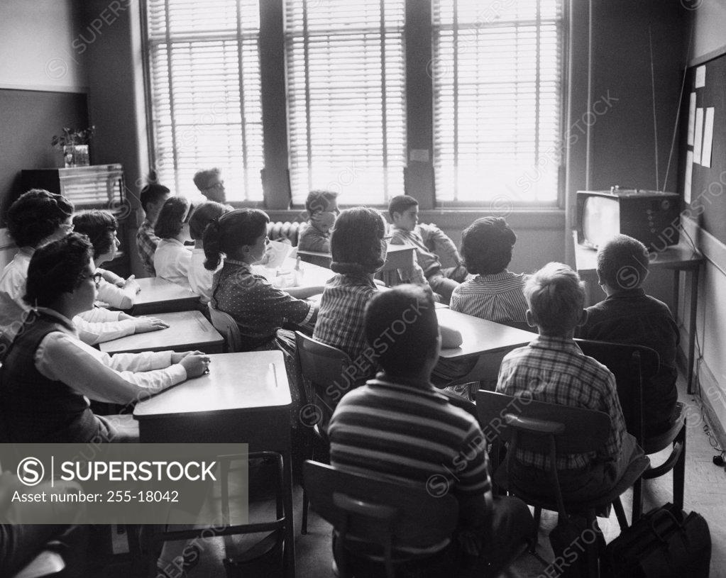 Stock Photo: 255-18042 Students watching television in the classroom