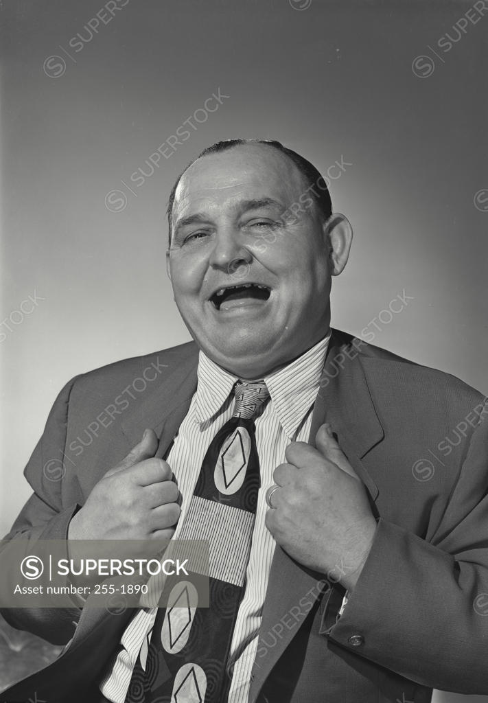Stock Photo: 255-1890 Portrait of a businessman laughing