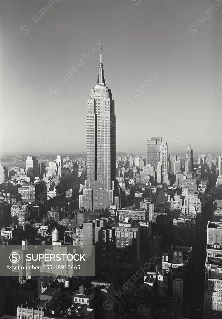 Vintage photograph. Empire State Building and mid town skyline, New York City.