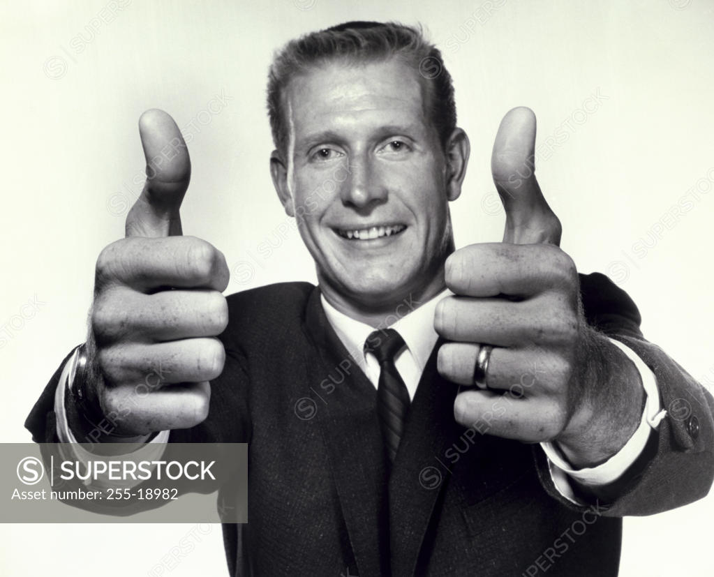 Stock Photo: 255-18982 Portrait of a business showing a thumbs up sign