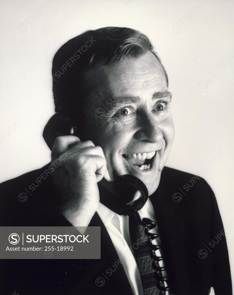 Stock Photo: 255-18992 Close-up of a businessman talking on the telephone