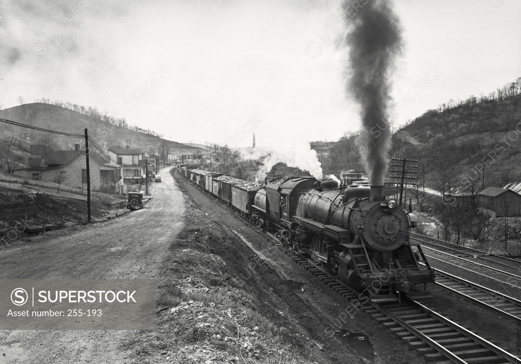 Stock Photo: 255-193 Coal train moving on railroad track, Baltimore And Ohio Railroad, Grafton, West Virginia, USA