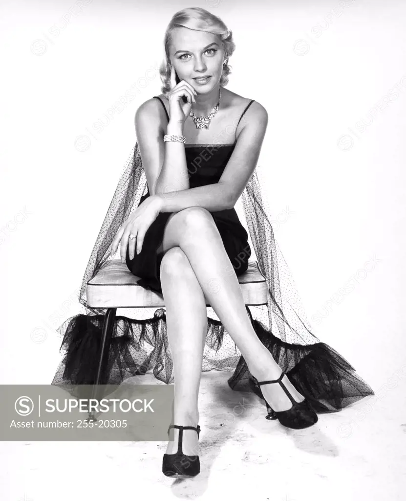 Young woman sitting on a chair