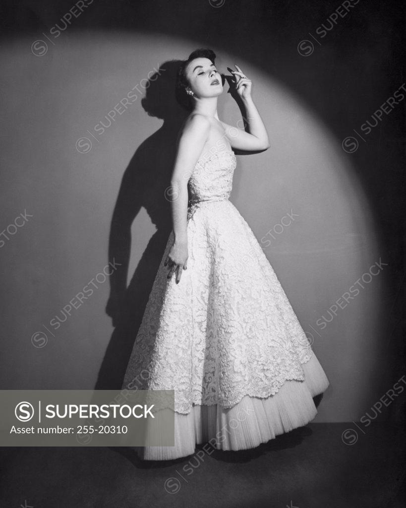 Stock Photo: 255-20310 Side profile of young woman posing