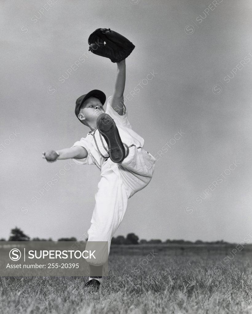Stock Photo: 255-20395 Boy pitching ball