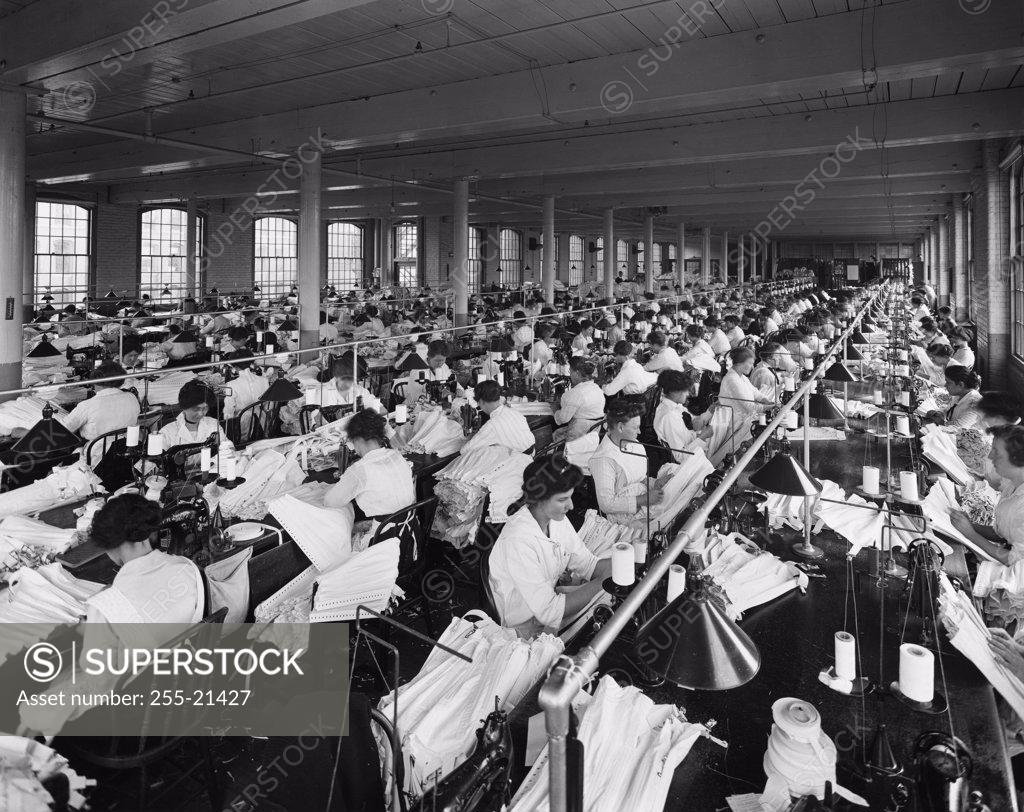 Stock Photo: 255-21427 Group of female workers in a textile factory, 1900s