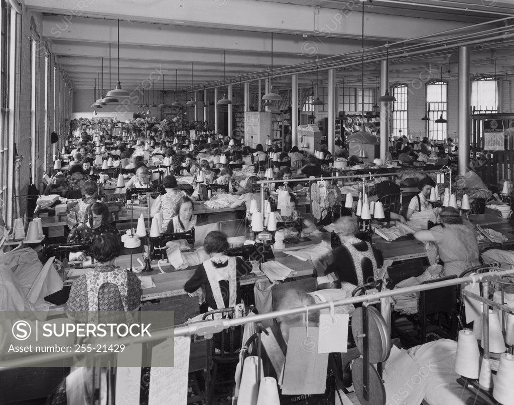 Stock Photo: 255-21429 Group of female workers in a textile factory, 1900s