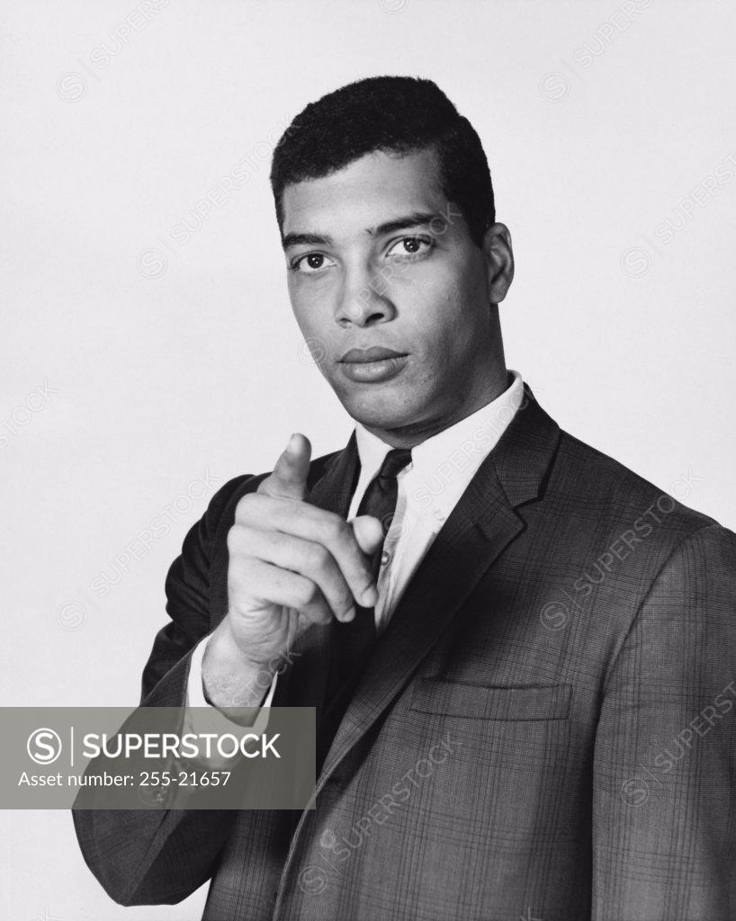 Stock Photo: 255-21657 Close-up of a businessman pointing with his finger