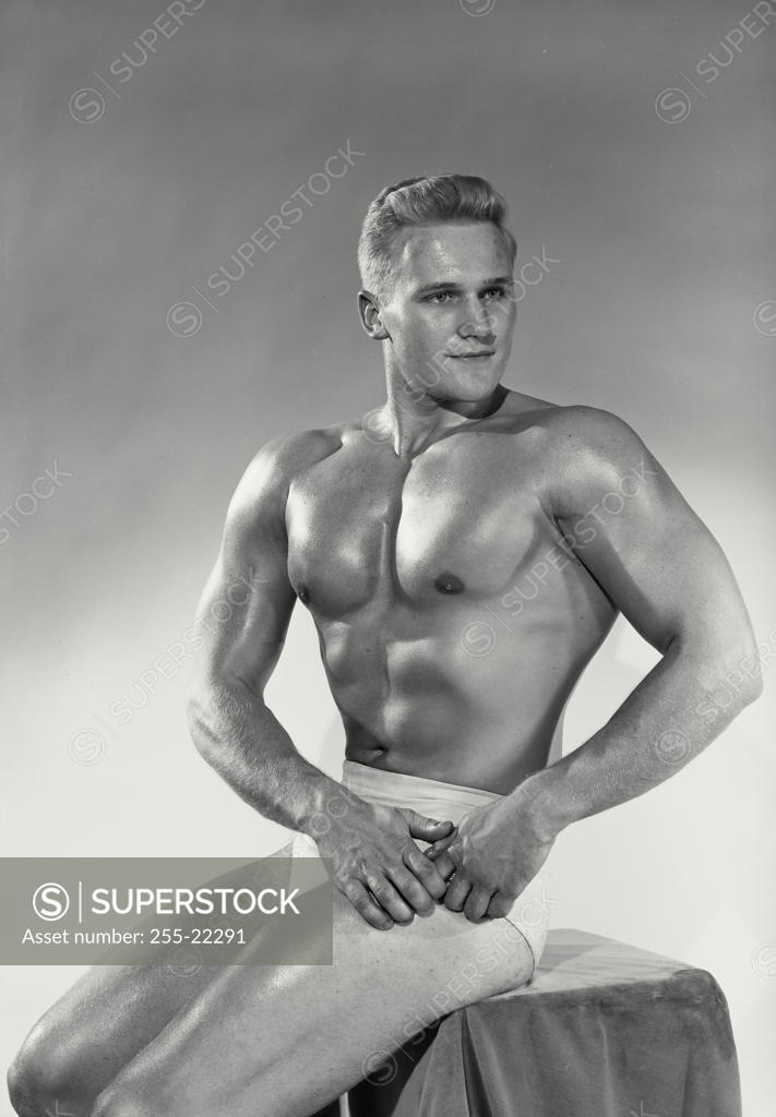 Stock Photo: 255-22291 Male body builder flexing his muscles