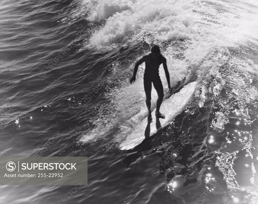Stock Photo: 255-22952 High angle view of a man surfing in the sea