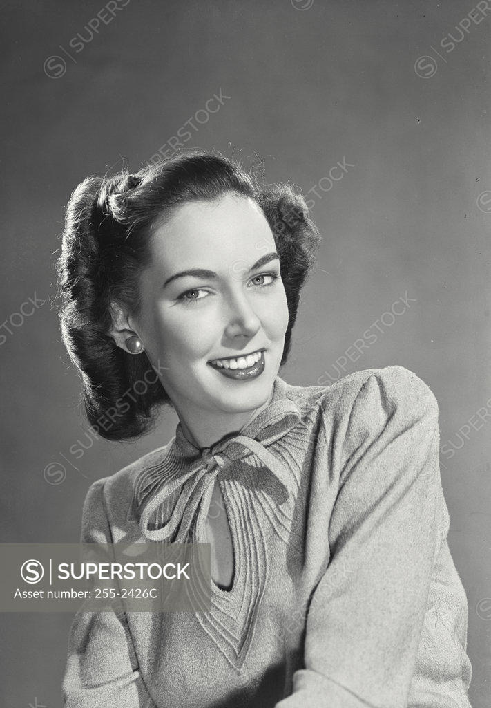 Stock Photo: 255-2426C Portrait of young woman smiling