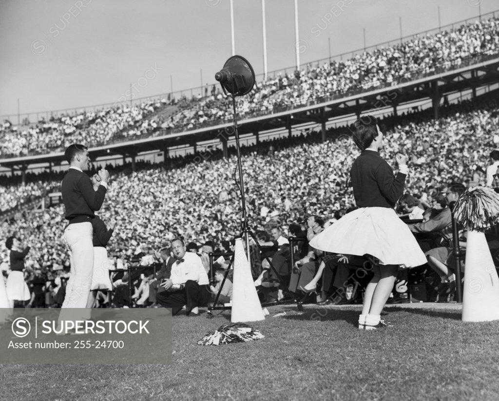 Stock Photo: 255-24700 Cheerleaders performing in a stadium