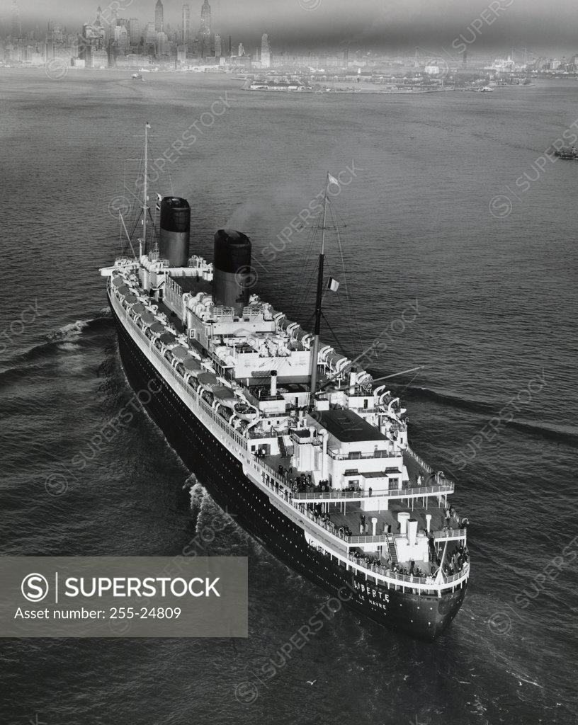 Stock Photo: 255-24809 High angle view of a cruise ship in the sea, SS Liberte, New York Harbor, New York City, New York State, USA