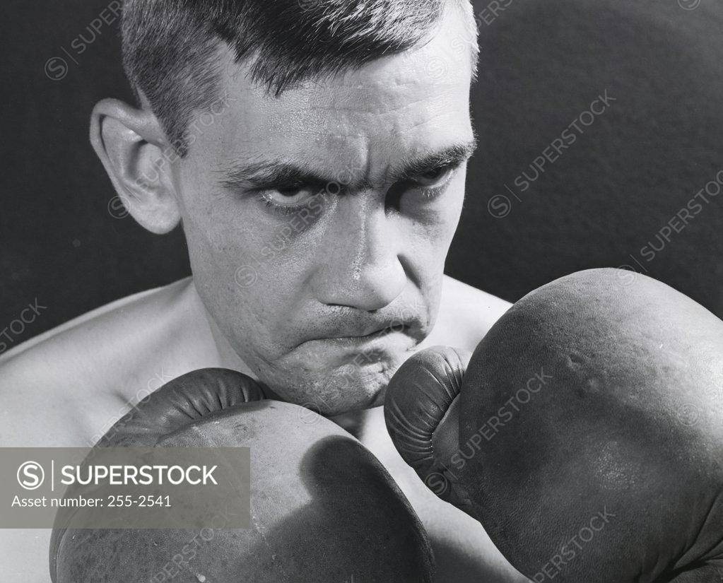 Stock Photo: 255-2541 Mid adult man in a fighting stance