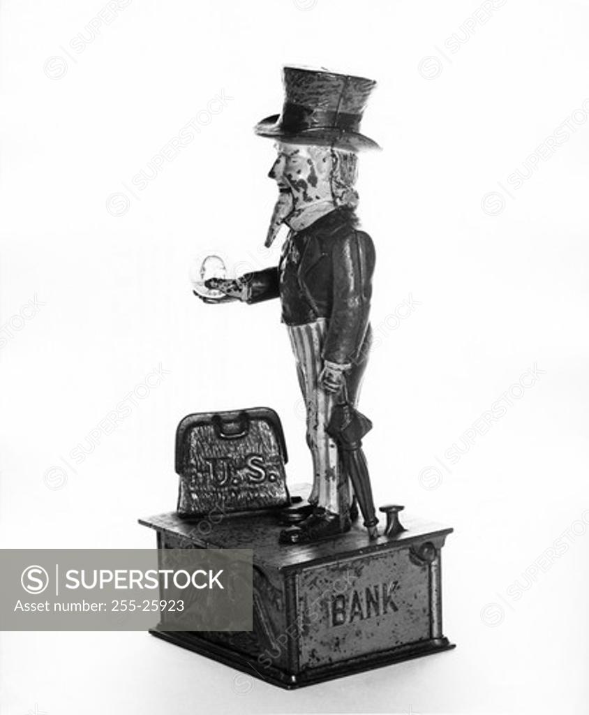 Stock Photo: 255-25923 Close-up of a figurine of Uncle Sam on a mechanical bank