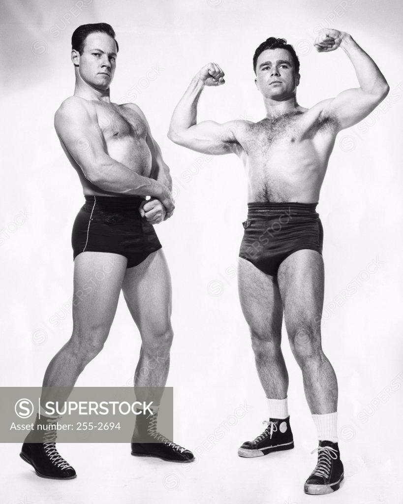 Stock Photo: 255-2694 Two male body builders flexing their muscles