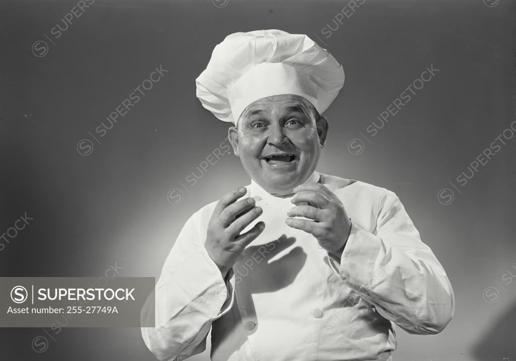 Stock Photo: 255-27749A Portrait of a chef laughing