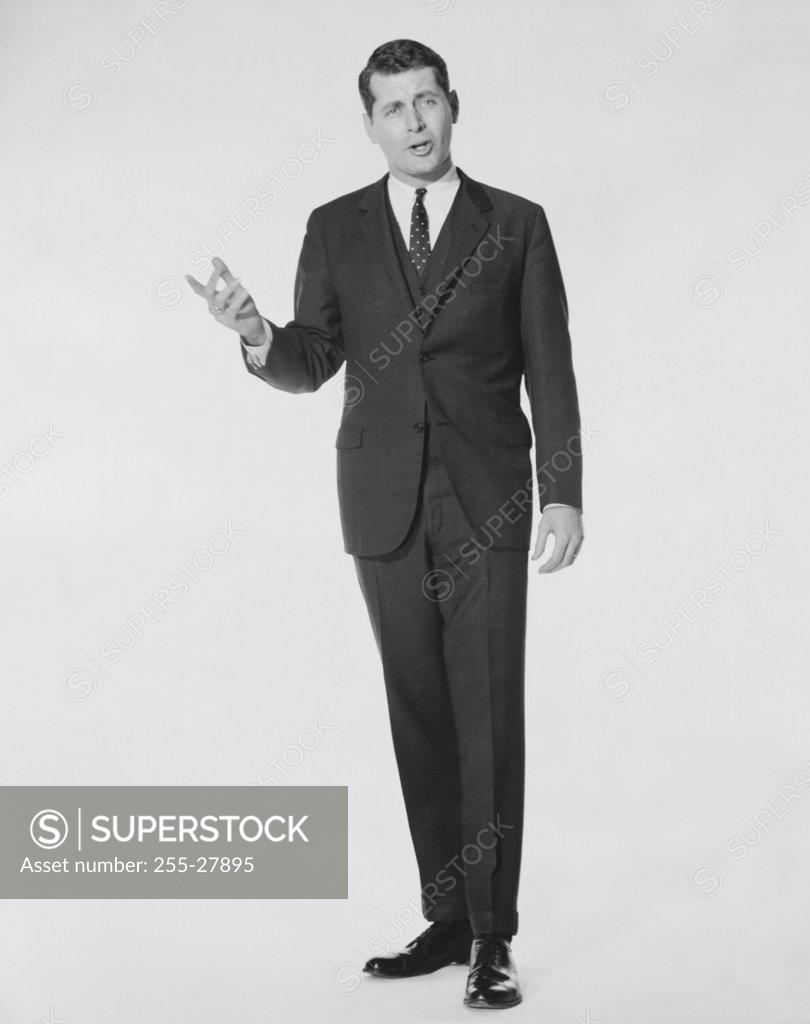 Stock Photo: 255-27895 Portrait of a businessman gesturing