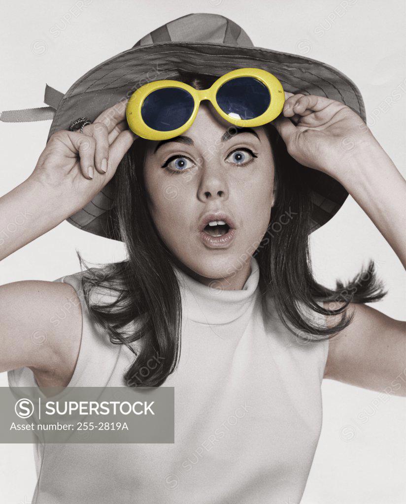 Stock Photo: 255-2819A Portrait of a young woman looking surprised