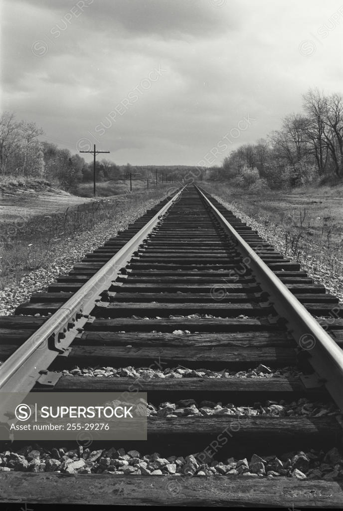 Stock Photo: 255-29276 Railroad track passing through a landscape
