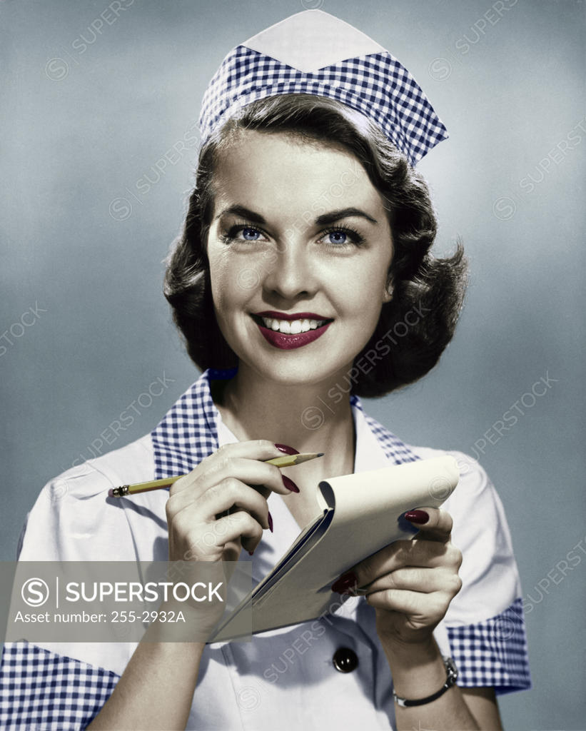 Stock Photo: 255-2932A Portrait of a waitress taking a food order